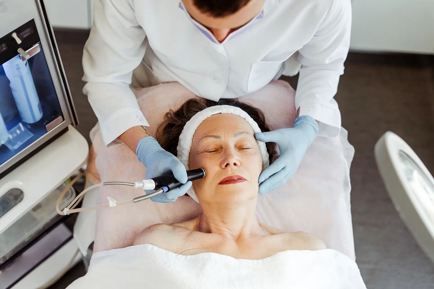 aerial shot of older woman receiving treatment